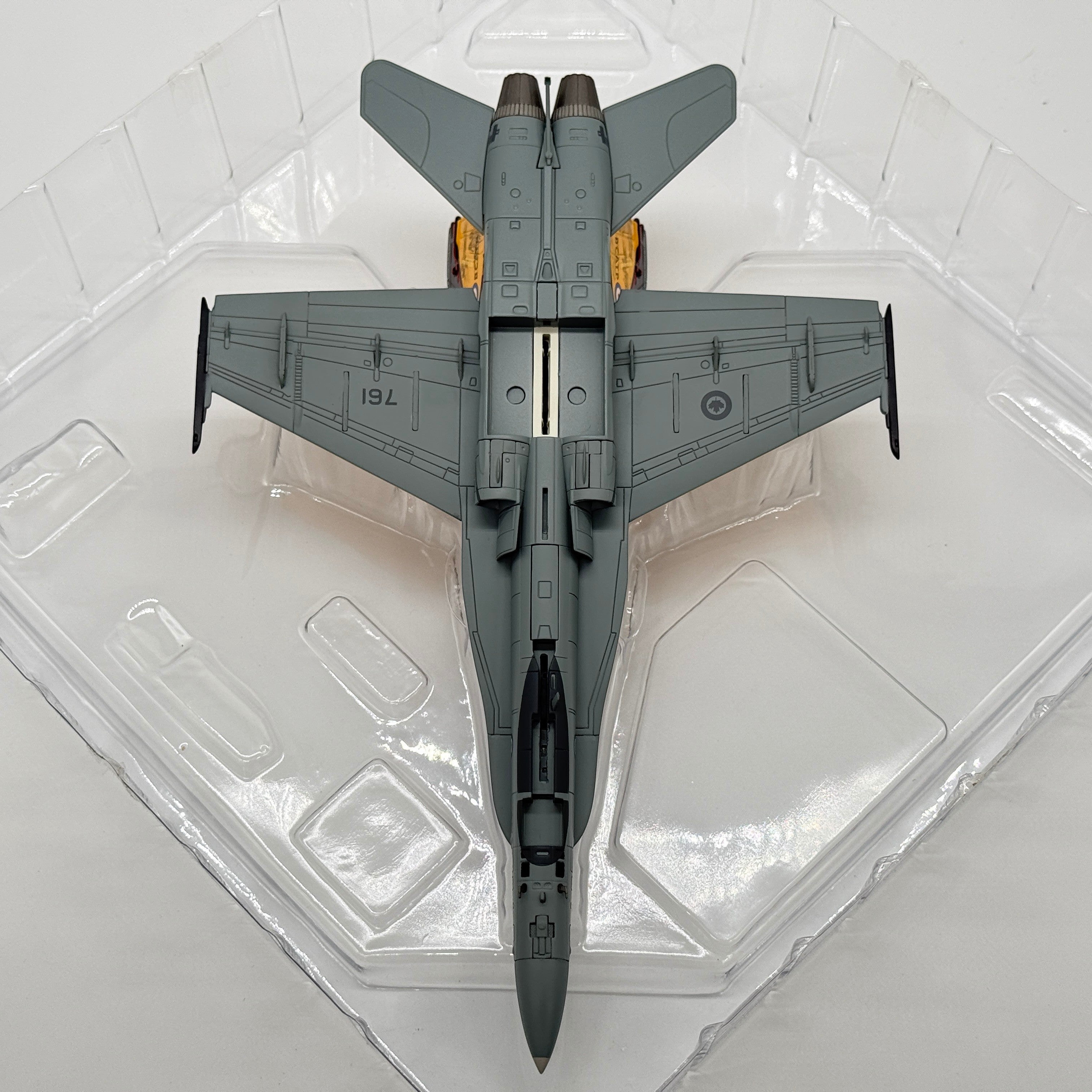 The Collectables Vault 1:72 scale diecast CF-18 Hornet model in grey, viewed from above in its protective packaging.
