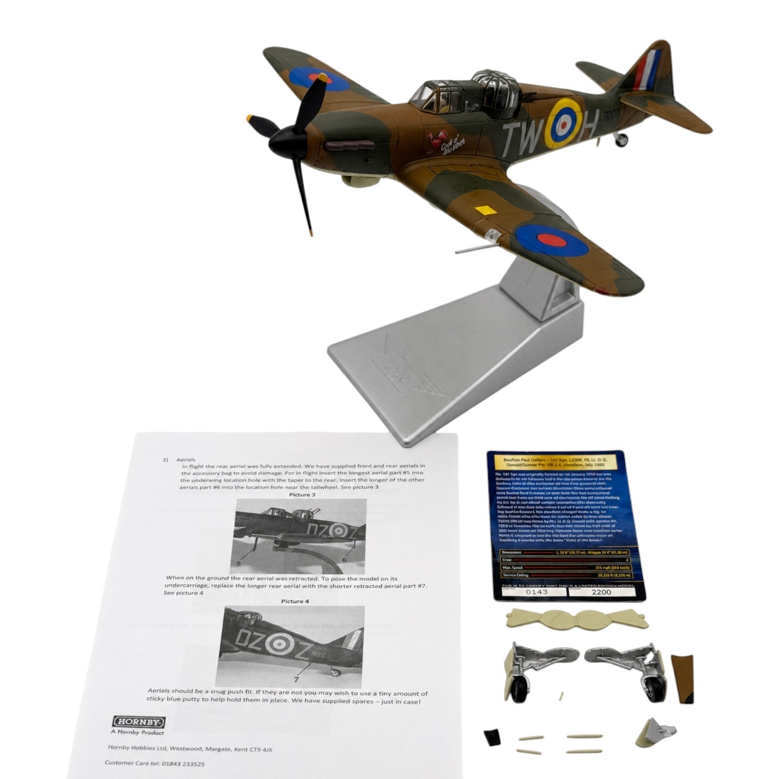 Pre-owned diecast aircraft displayed with its removable landing gear, weapons, stand and original accessories